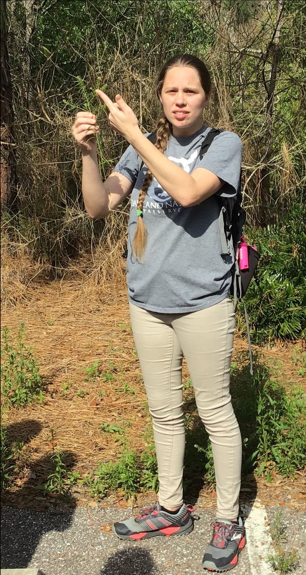 Christi Diaz Hunt teaching participants about edible plants