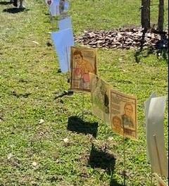 A view of several pieces of student artwork displayed in the Harmony Walk. 